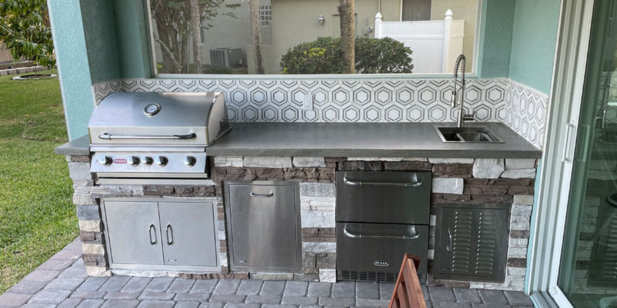 Outdoor kitchen by Brevard Outdoor Services